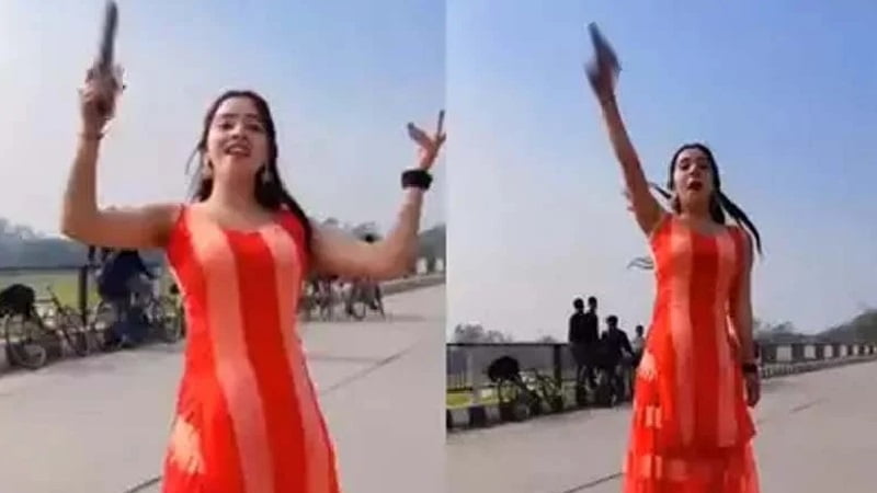 মাঝ রাস্তায় পিস্তল হাতে নারী ইউটিউবারের নাচ, ভিডিও ভাইরাল - West Bengal News 24